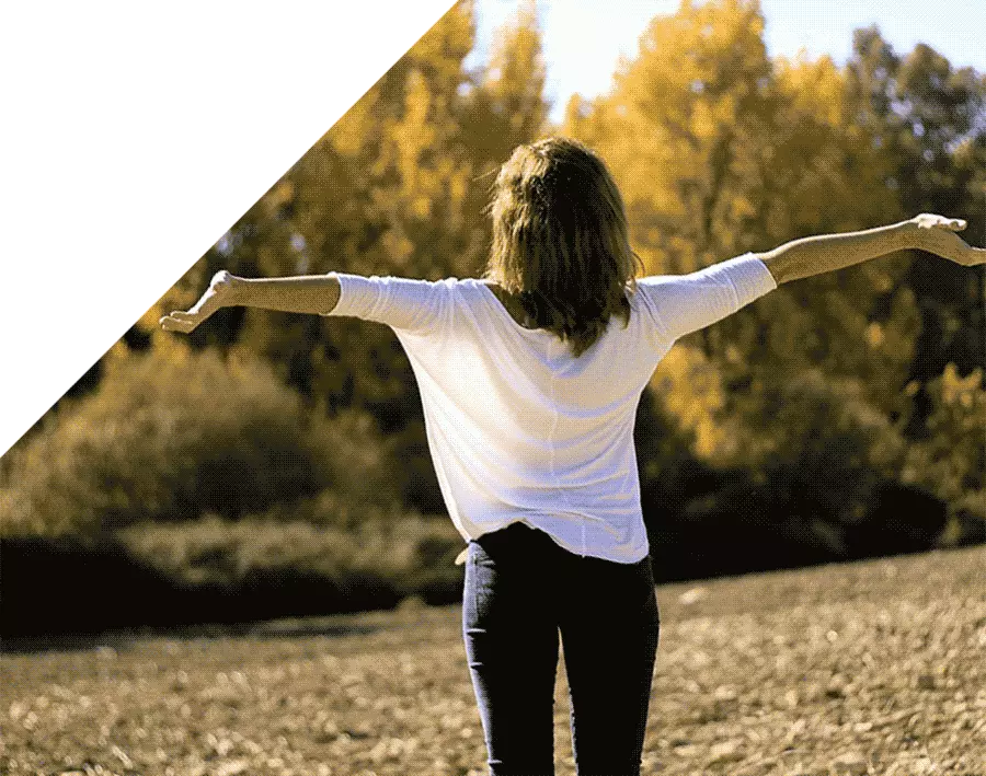 woman-celebrating-in-forest-normal-colour